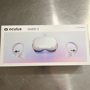 Lightly used Meta Quest 2 with elite strap, controllers, and charger.